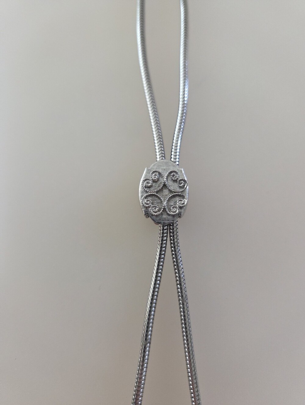 Vintage Metal Bolo With Floral Design
